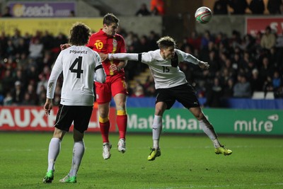 060213 - Wales v Austria, Vauxhall International Friendly Match, Swansea - Wales' Sam Vokes heads home to score Wales' second goal