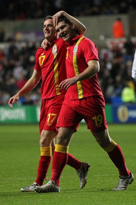 060213 - Wales v Austria, Vauxhall International Friendly Match, Swansea - Wales' Sam Vokes is congratulated by Wales' Andrew King  after he scores Wales' second goal