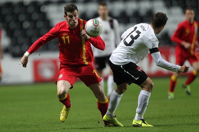 060213 - Wales v Austria, Vauxhall International Friendly Match, Swansea - Wales' Gareth Bale gets past Austria's Markus Suttner