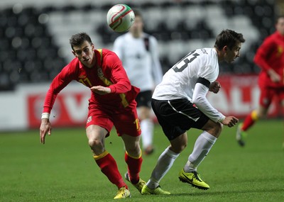 060213 - Wales v Austria, Vauxhall International Friendly Match, Swansea - Wales' Gareth Bale gets past Austria's Markus Suttner