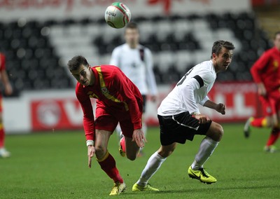 060213 - Wales v Austria, Vauxhall International Friendly Match, Swansea - Wales' Gareth Bale gets past Austria's Markus Suttner