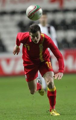 060213 - Wales v Austria, Vauxhall International Friendly Match, Swansea - Wales' Gareth Bale gets past Austria's Markus Suttner