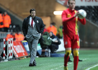 060213 - Wales v Austria, Vauxhall International Friendly Match, Swansea - Wales' manager Chris Coleman looks on as Wales beat Austria