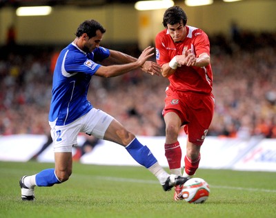 06.09.08 - World Cup 2010 Qualifying Wales v Azerbaijan Wales' Gareth Bale is challenged by Azerbaijan's Rail Melikov 