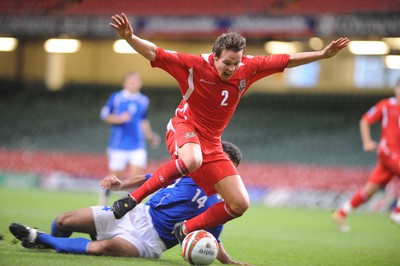 06.09.08 - World Cup 2010 Qualifying Wales v Azerbaijan Wales' Chris Gunther is brought down by a challenge from Azerbaijan's Rashad Sadikhov to claim a penalty 