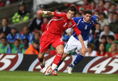 06.09.08... Wales v Azerbaijan, World Cup 2010 Qualifying Match, Cardiff  -  Wales' Gareth Bale holds off Azerbaijan's Djavid Huseinov  