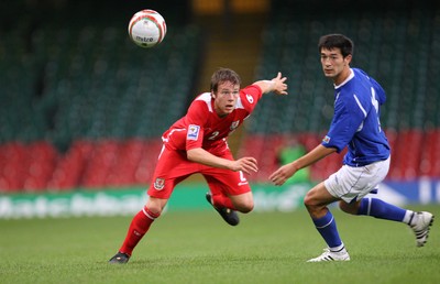 06.09.08... Wales v Azerbaijan, World Cup 2010 Qualifying Match, Cardiff  -  Wales' Chris Gunter plays the ball past Azerbaijan's Elvin Mamedov 