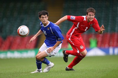 06.09.08... Wales v Azerbaijan, World Cup 2010 Qualifying Match, Cardiff  -  Wales' Chris Gunter plays the ball past Azerbaijan's Elvin Mamedov 