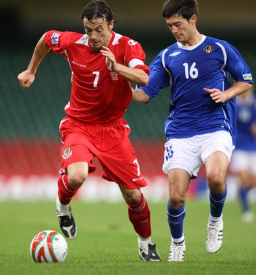 06.09.08... Wales v Azerbaijan, World Cup 2010 Qualifying Match, Cardiff  -  Wales' Simon Davies gets past Azerbaijan's Elvin Mamedov  