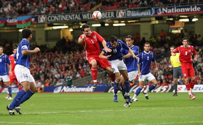06.09.08... Wales v Azerbaijan, World Cup 2010 Qualifying Match, Cardiff  -  Wales' Craig Morgan beats Azerbaijan's Nodar Mamedov to head the ball at goal 