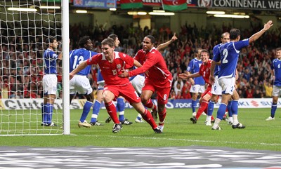 06.09.08... Wales v Azerbaijan, World Cup 2010 Qualifying Match, Cardiff  -  Wales' Sam Vokes (15) celebrates with Wales' Ashley Williams after scoring goal  