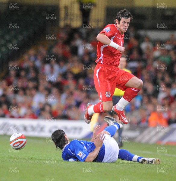 06.09.08 - World Cup 2010 Qualifying Wales v Azerbaijan Wales' Gareth Bale is tackled by Azerbaijan's Sahsa 