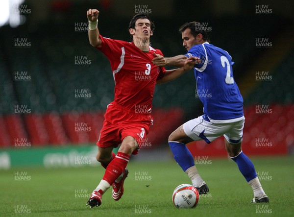 06.09.08... Wales v Azerbaijan, World Cup 2010 Qualifying Match, Cardiff  -  Wales' Gareth Bale is held by Azerbaijan's Rail Melikov 