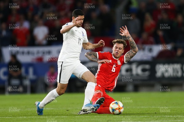 060919 - Wales v Azerbaijan, UEFA Euro 2020 Qualifier - Ramil Sheydaev of Azerbaijan is brought down by Joe Rodon of Wales