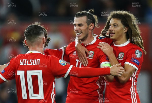 060919 - Wales v Azerbaijan, UEFA Euro 2020 Qualifier - Gareth Bale of Wales leads the celebrations with Harry Wilson of Wales and Ethan Ampadu of Wales as Wales take the lead
