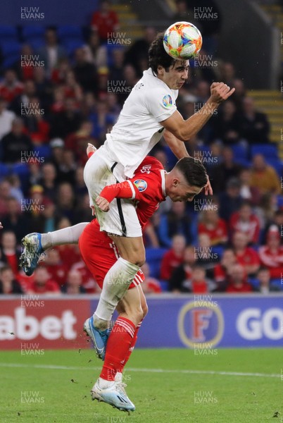 060919 - Wales v Azerbaijan, UEFA Euro 2020 Qualifier - Harry Wilson of Wales and Bahlul Mustafazade of Azerbaijan compete for the ball