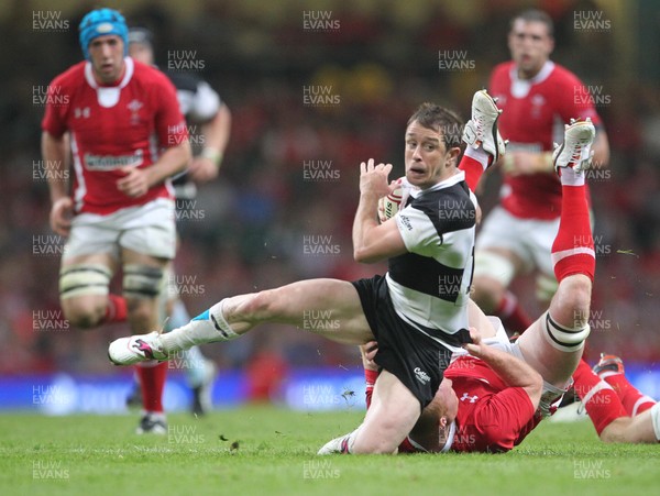 020612  Wales v Barbarians…Barbarians Shane Williams is tackled by  Martyn Williams