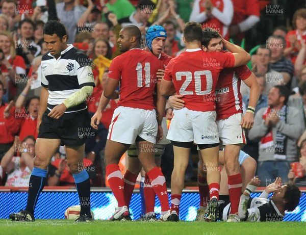 020612 - Wales v Barbarians - Powered by Under Armour - Try scorer James Hook of Wales (right) is congratulated by team mate Rhys Webb of Wales