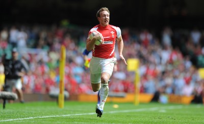 04.06.11 - Wales v Barbarians - DHL Challenge - Morgan Stoddart of Wales breaks away to score try. 