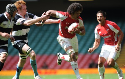 04.06.11 - Wales v Barbarians - DHL Challenge - Toby Faletau of Wales takes on Paul Tito of Barbarians. 
