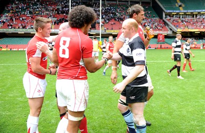 04.06.11 - Wales v Barbarians - DHL Challenge - Toby Faletau of Wales and Martyn Williams of Barbarians shake hands at the end of the game. 