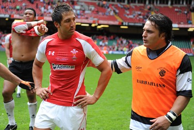 04.06.11 - Wales v Barbarians - DHL Challenge - Gavin Henson of Wales and Sebastien Bruno of Barbarians at the end of the game. 