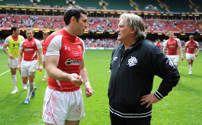 04.06.11 - Wales v Barbarians - DHL Challenge - Stephen Jones of Wales and Barbarians assistant coach Scott Johnson at the end of the game. 