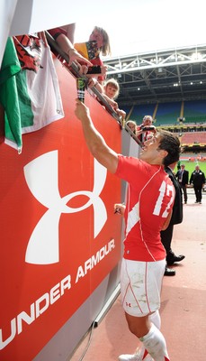 04.06.11 - Wales v Barbarians - DHL Challenge - Gavin Henson of Wales signs autographs after the match. 