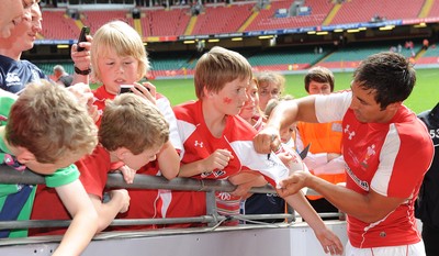 04.06.11 - Wales v Barbarians - DHL Challenge - Gavin Henson of Wales signs autographs after the match. 