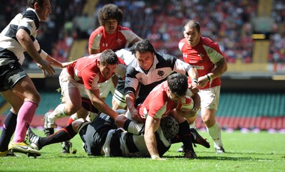 04.06.11 - Wales v Barbarians - DHL Challenge - Mike Phillips of Wales scores try. 