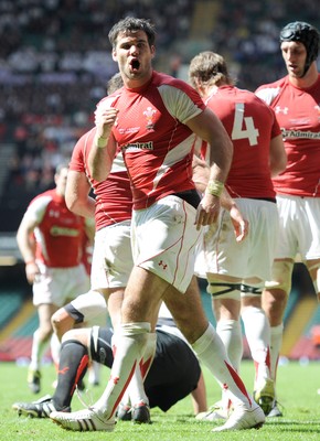 04.06.11 - Wales v Barbarians - DHL Challenge - Mike Phillips of Wales celebrates try. 