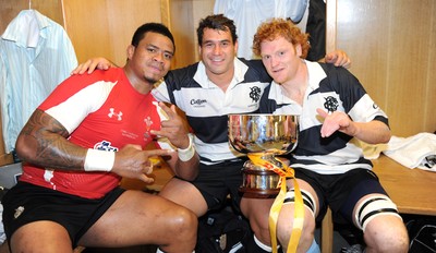 04.06.11 - Wales v Barbarians - DHL Challenge - Iosefa Tekori, George Smith and Paul Tito of Barbarians celebrate with the winners trophy in the changing rooms. 