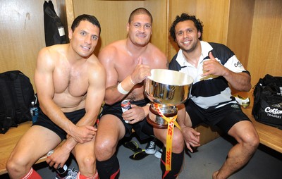 04.06.11 - Wales v Barbarians - DHL Challenge - Doug Howlett, Willie Mason and Isa Nacewa of Barbarians celebrate with the winners trophy in the changing rooms. 