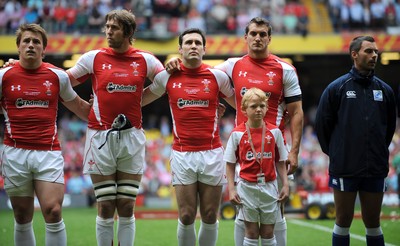 04.06.11 - Wales v Barbarians - DHL Challenge - Jonathan Davies, Ryan Jones, Stephen Jones and Sam Warburton of Wales line up for the national anthems with match mascot Thomas Hughes. 