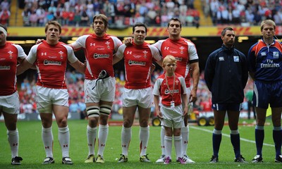 04.06.11 - Wales v Barbarians - DHL Challenge - Jonathan Davies, Ryan Jones, Stephen Jones and Sam Warburton of Wales line up for the national anthems with match mascot Thomas Hughes. 