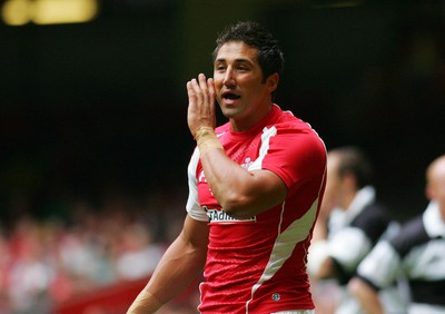 04.06.11 Wales v The Barbarians - DHL Challenge WRU 130th Anniversary Match - Wales's Gavin Henson makes a defensive call. 