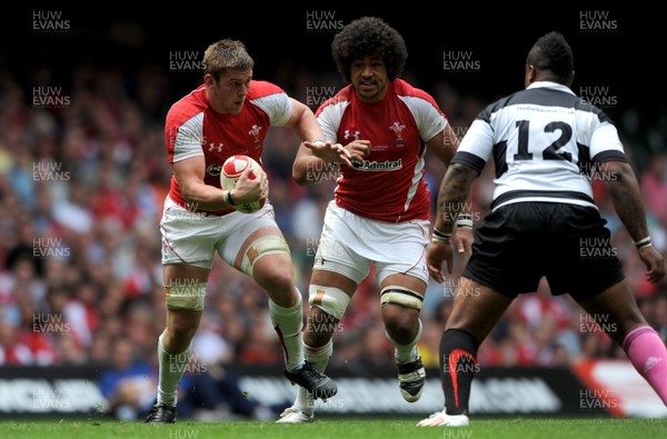 04.06.11 - Wales v Barbarians - DHL Challenge - Dan Lydiate of Wales takes on Mathieu Bastareaud of Barbarians. 