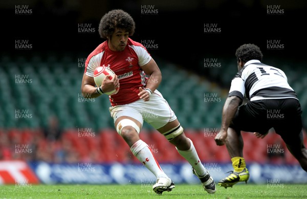 04.06.11 - Wales v Barbarians - DHL Challenge - Toby Faletau of Wales takes on Seru Rabeni of Barbarians. 