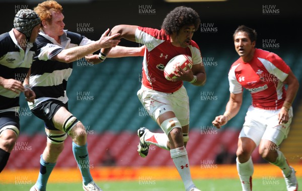04.06.11 - Wales v Barbarians - DHL Challenge - Toby Faletau of Wales takes on Paul Tito of Barbarians. 