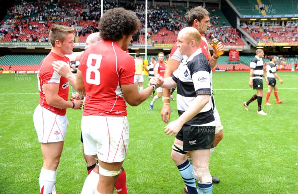 04.06.11 - Wales v Barbarians - DHL Challenge - Toby Faletau of Wales and Martyn Williams of Barbarians shake hands at the end of the game. 
