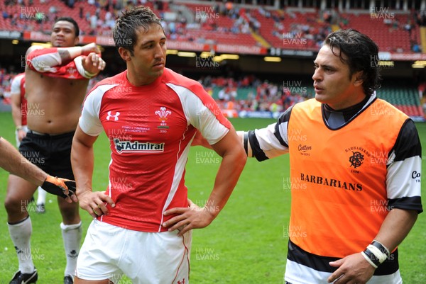 04.06.11 - Wales v Barbarians - DHL Challenge - Gavin Henson of Wales and Sebastien Bruno of Barbarians at the end of the game. 