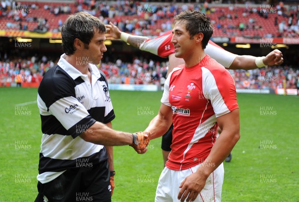 04.06.11 - Wales v Barbarians - DHL Challenge - Gavin Henson of Wales and Brock James of Barbarians at the end of the game. 