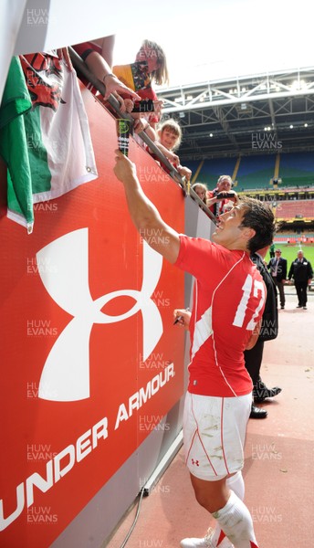 04.06.11 - Wales v Barbarians - DHL Challenge - Gavin Henson of Wales signs autographs after the match. 