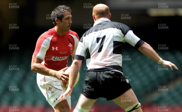 04.06.11 - Wales v Barbarians - DHL Challenge - Gavin Henson of Wales takes on Martyn Williams of Barbarians. 