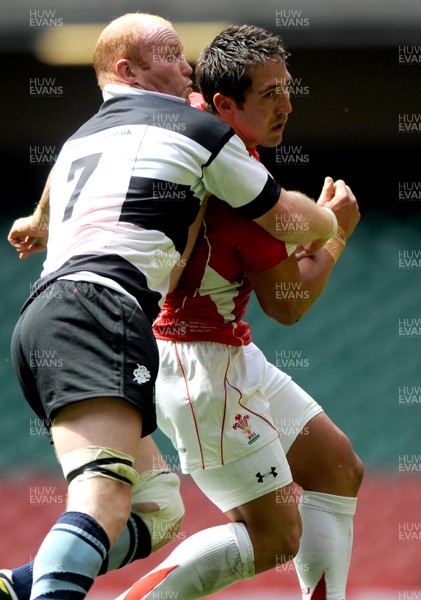 04.06.11 - Wales v Barbarians - DHL Challenge - Gavin Henson of Wales takes on Martyn Williams of Barbarians. 
