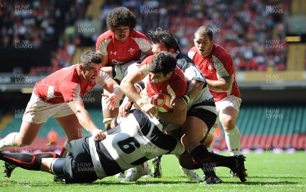 04.06.11 - Wales v Barbarians - DHL Challenge - Mike Phillips of Wales scores try. 