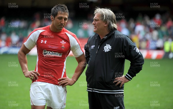04.06.11 - Wales v Barbarians - DHL Challenge - Gavin Henson of Wales talks to Barbarians assistant coach Scott Johnson at the end of the game. 