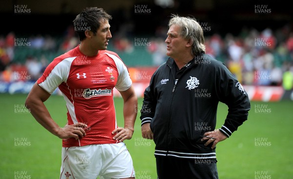 04.06.11 - Wales v Barbarians - DHL Challenge - Gavin Henson of Wales talks to Barbarians assistant coach Scott Johnson at the end of the game. 
