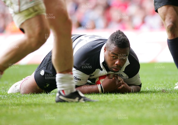 04.06.11 Wales v The Barbarians - DHL Challenge WRU 130th Anniversary Match - Barbarians' Mathieu Bastareaud dives in to score. 