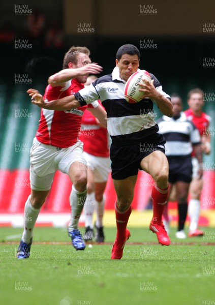 04.06.11 Wales v The Barbarians - DHL Challenge WRU 130th Anniversary Match - Barbarians' Doug Howlett is tackled by Wales' Morgan Stoddart. 